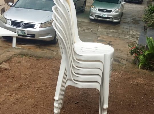 White plastic chair for rent